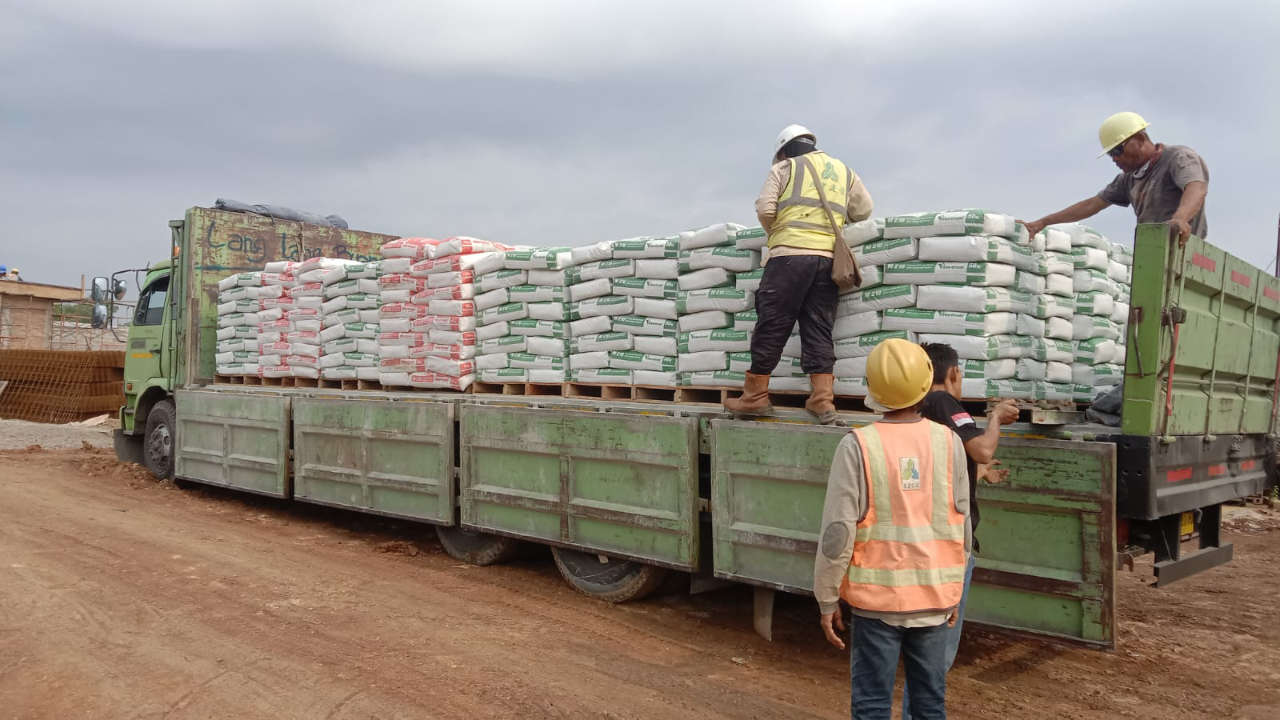Pengiriman material Pasangan Bata Merah Plaster Mortindo M210 dan Acian Mortindo M220